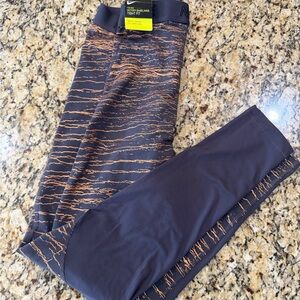 Nike Black and Gold Patterned Leggings size small new w tags